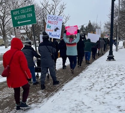 Hollanders march in protest of Trump, demand Huizenga meet with constituents